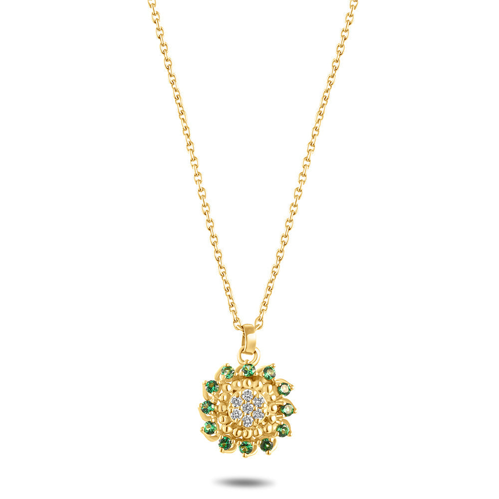 An 18K gold diamond necklace with a central emerald stone, surrounded by smaller diamonds, on a yellow gold chain.