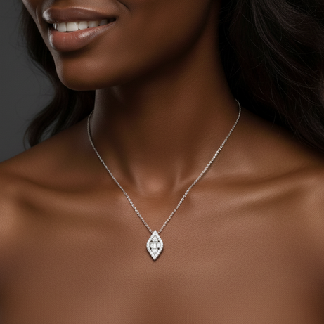 Woman wearing a White gold necklace with a diamond pendant