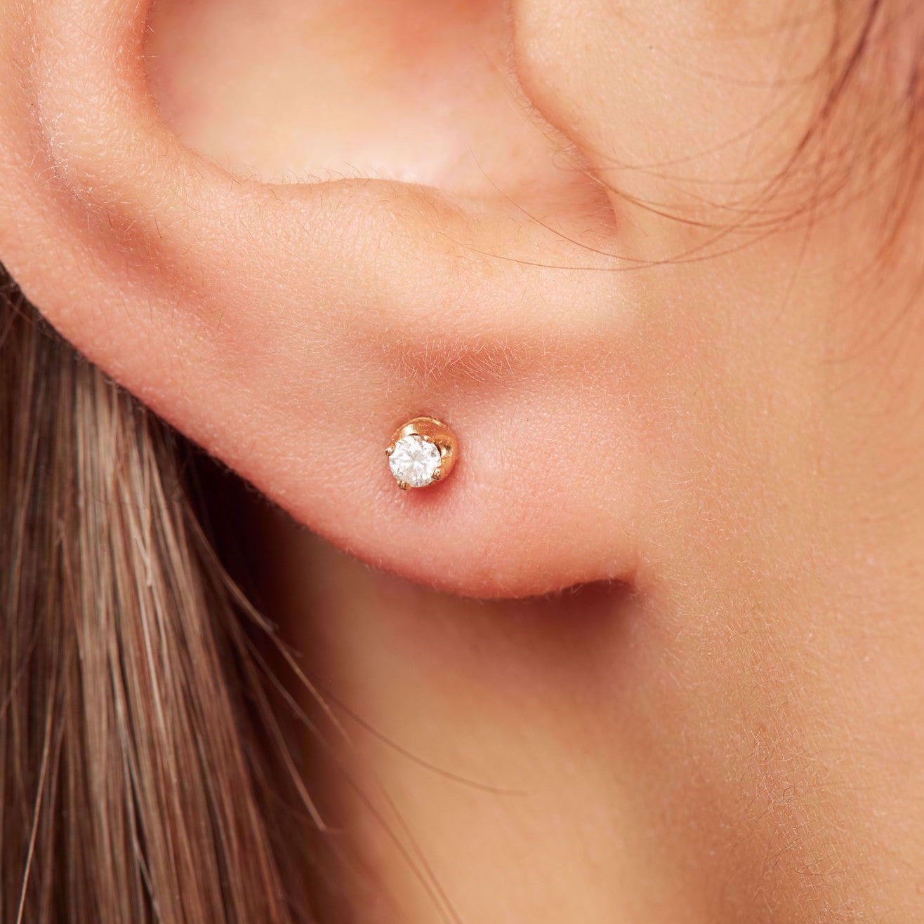 Single diamond stone stud earrings in 18k Yellow gold - SIR1128E