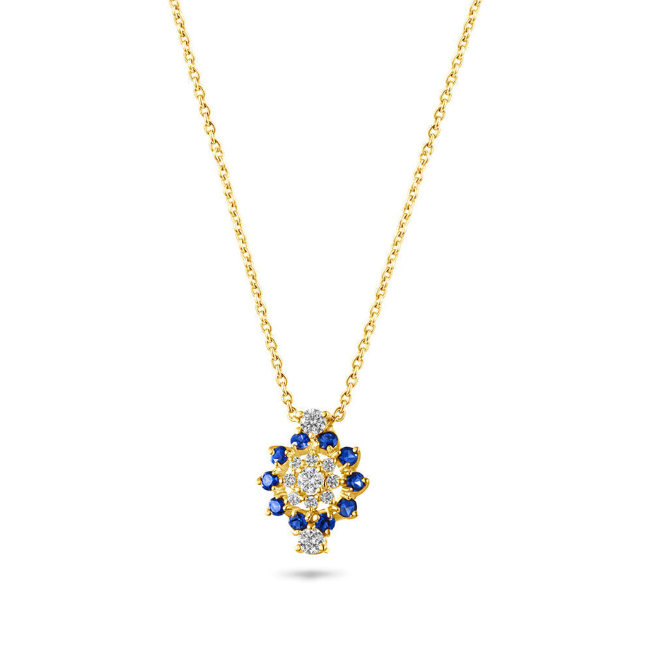An 18K gold necklace with a floral cluster pendant featuring a central sapphire stone surrounded by small sparkling diamonds