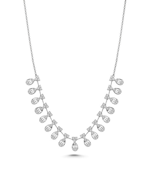 An 18K white gold diamond necklace with multiple teardrop shaped diamond Stations