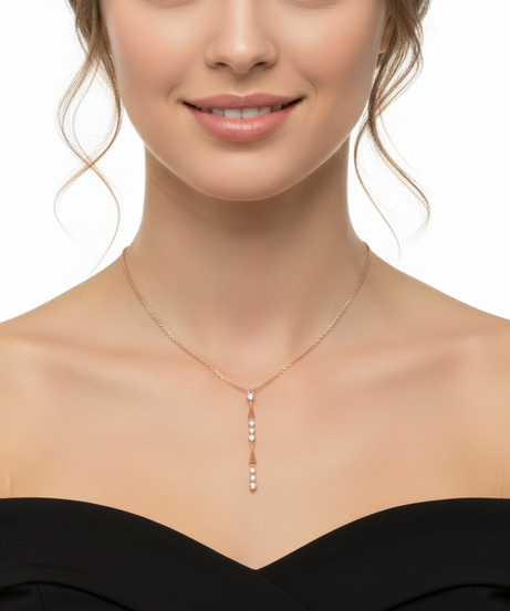 Woman wearing a delicate necklace with a clear pendant - Siran By Iram