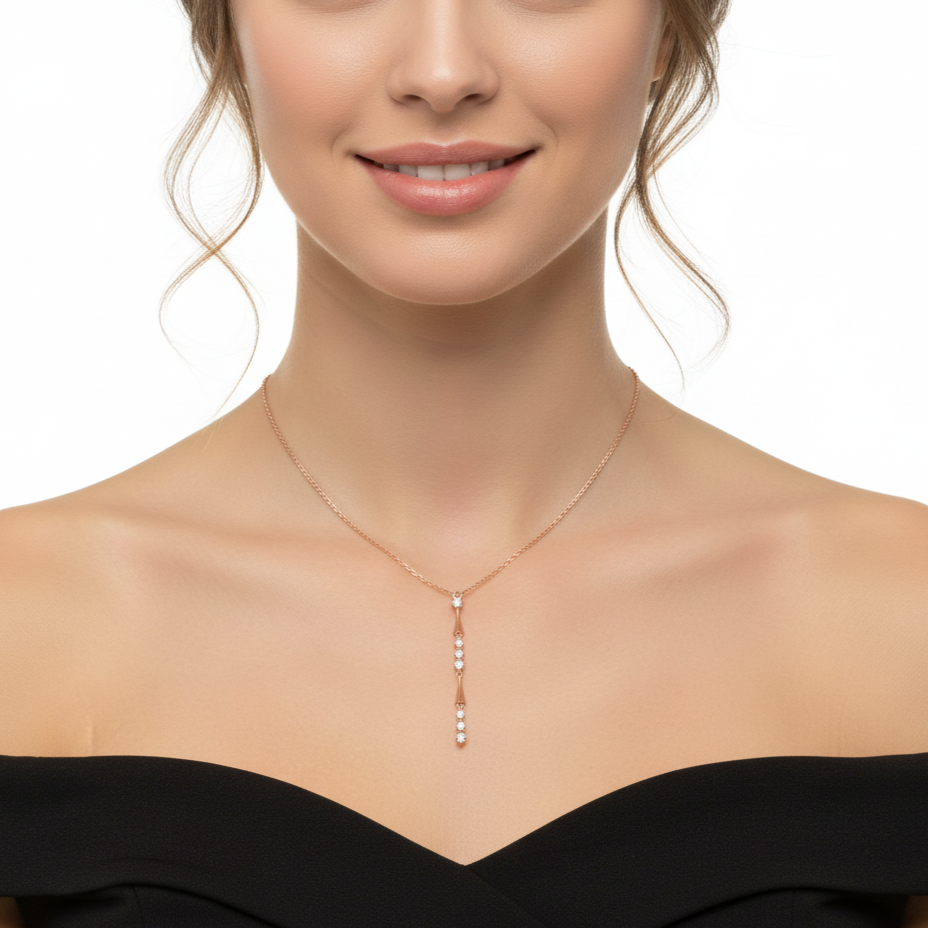 Woman wearing a delicate necklace with a clear pendant - Siran By Iram