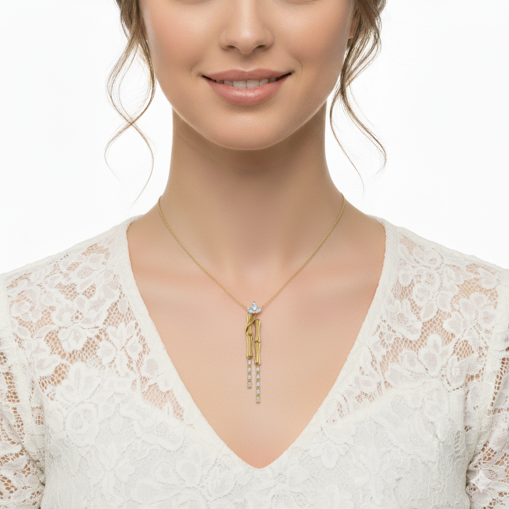 Woman wearing a gold necklace with a pendant - Siran By IRAM