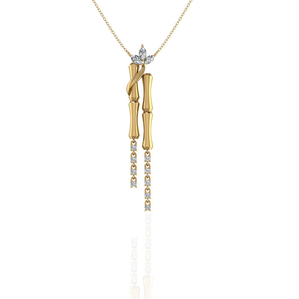 An 18k yellow gold double bamboo stalk pendant with hanging diamonds and a decorative marquise leaf.