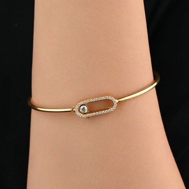 Classic gold bangle with a small round centerpiece - S-B302S
