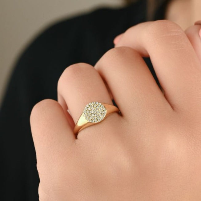 Gold ring adorned with small diamonds encircling the round shape - S-R174SONB